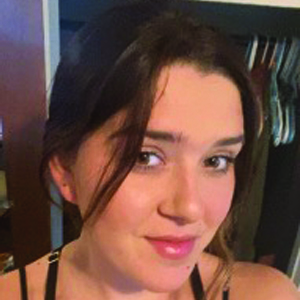 student smiling at camera
