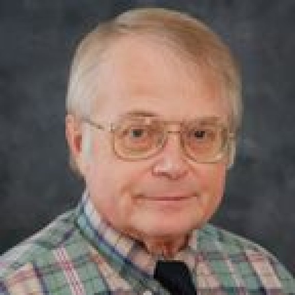 Person wearing glasses smiling