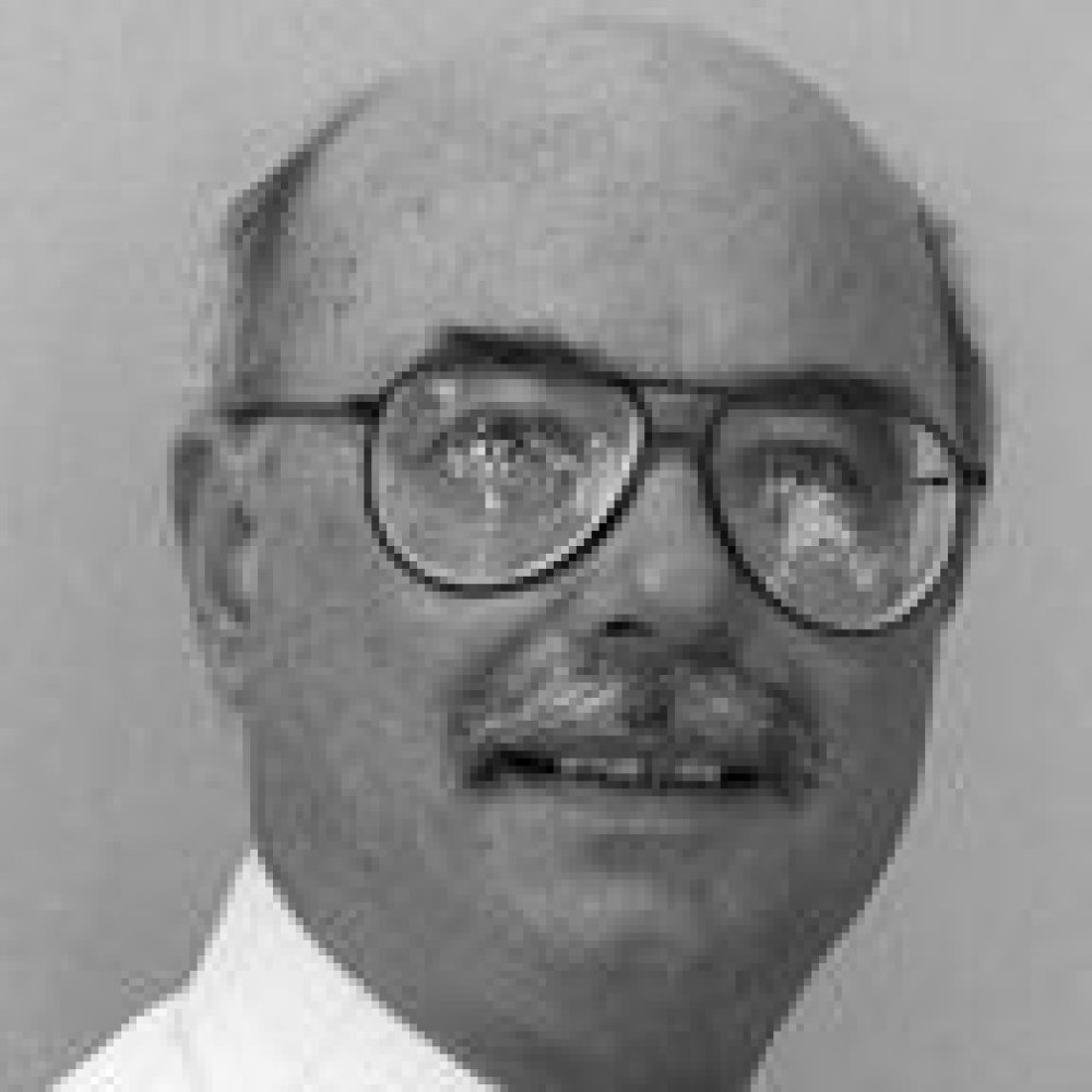Person wearing glasses smiling
