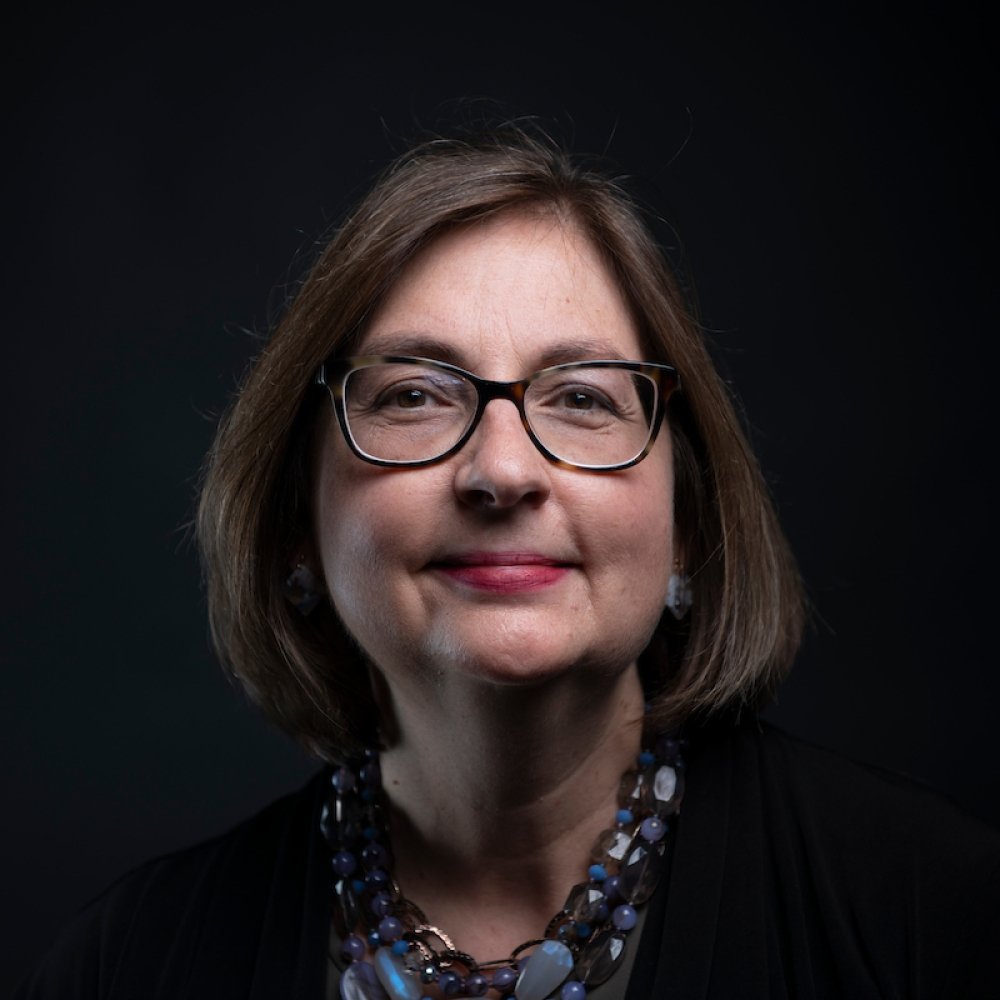 Person wearing glasses smiling