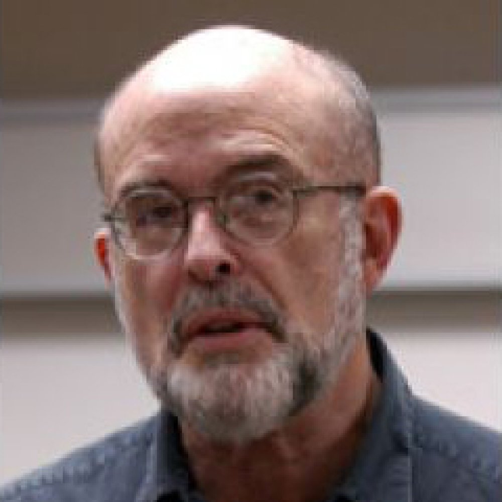Person wearing glasses smiling