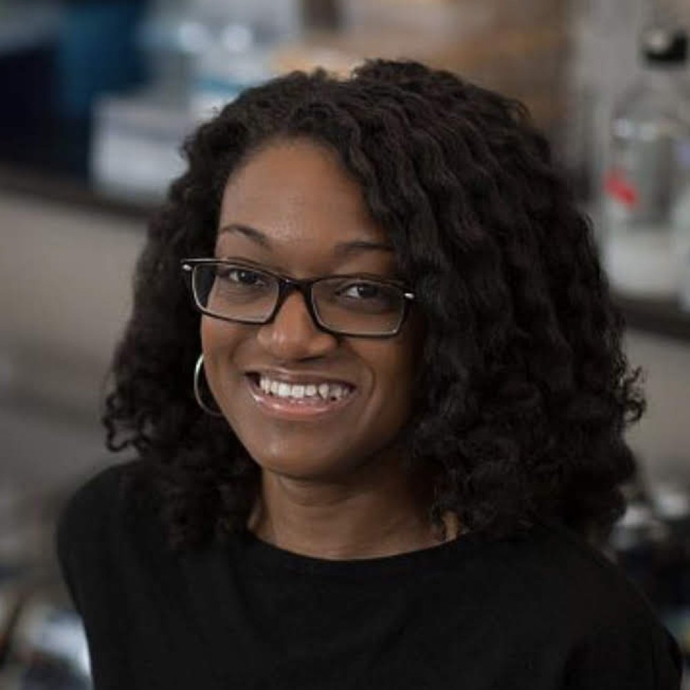 Person wearing glasses smiling