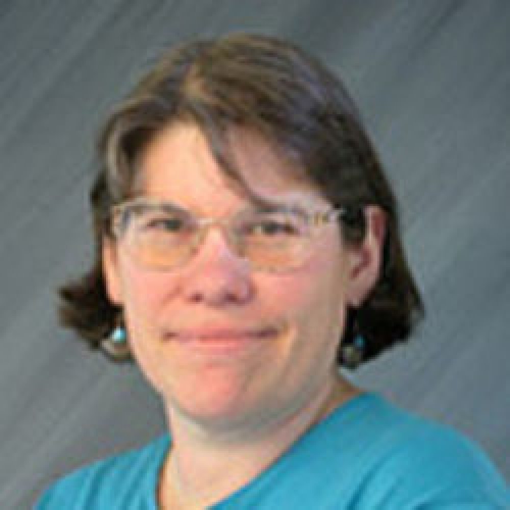 Person wearing glasses smiling