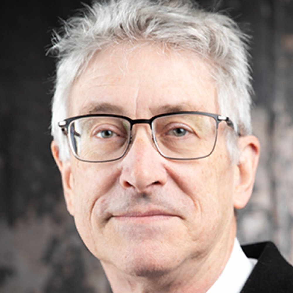 Person wearing glasses smiling