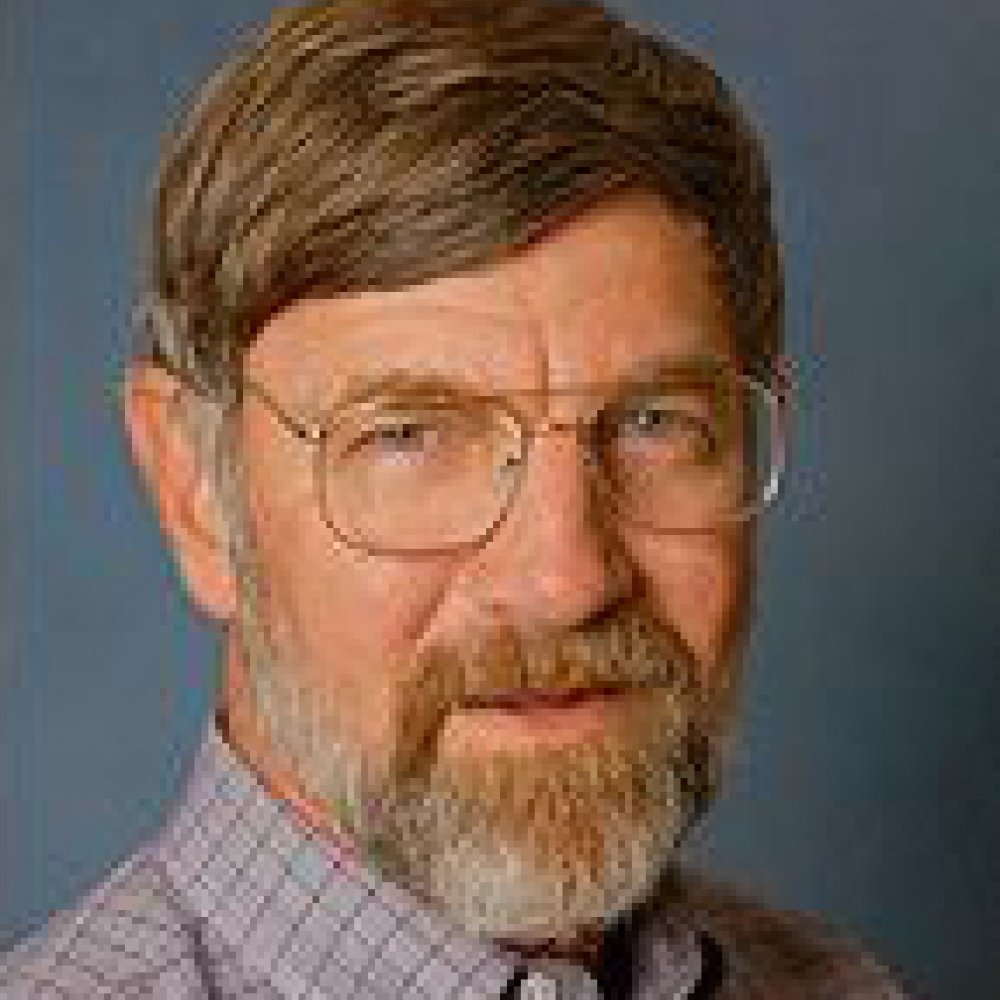 Person wearing glasses smiling