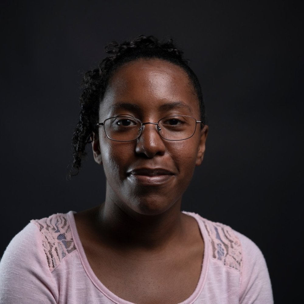 Person wearing glasses smiling
