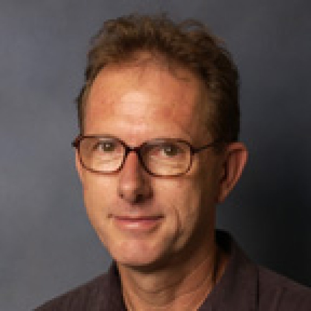 Person wearing glasses smiling