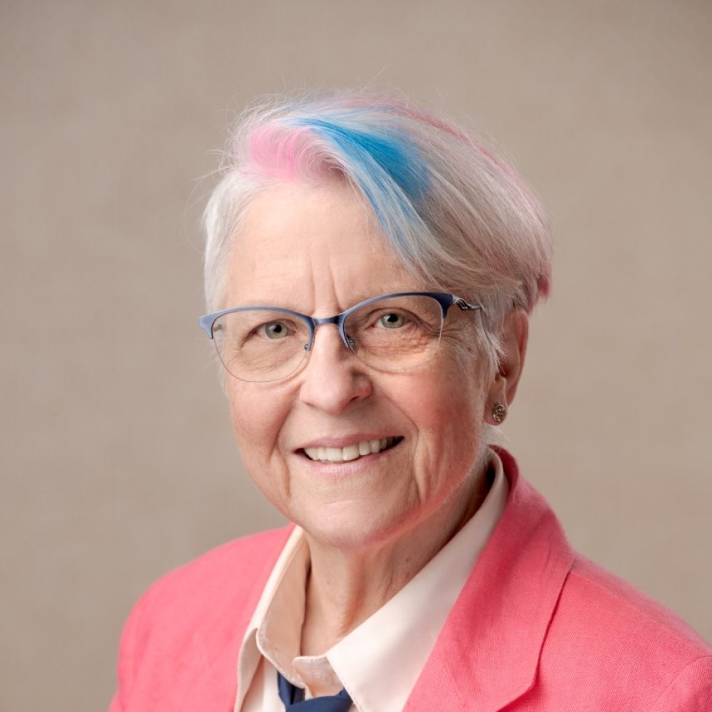 Person wearing glasses smiling