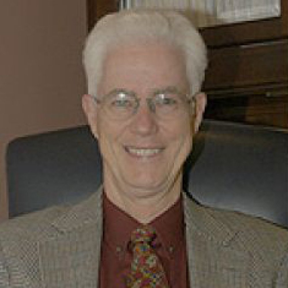 Person wearing glasses smiling