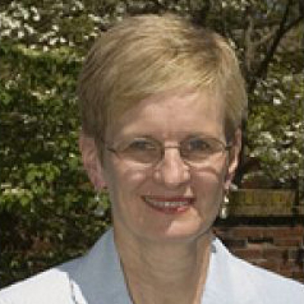 Person wearing glasses smiling
