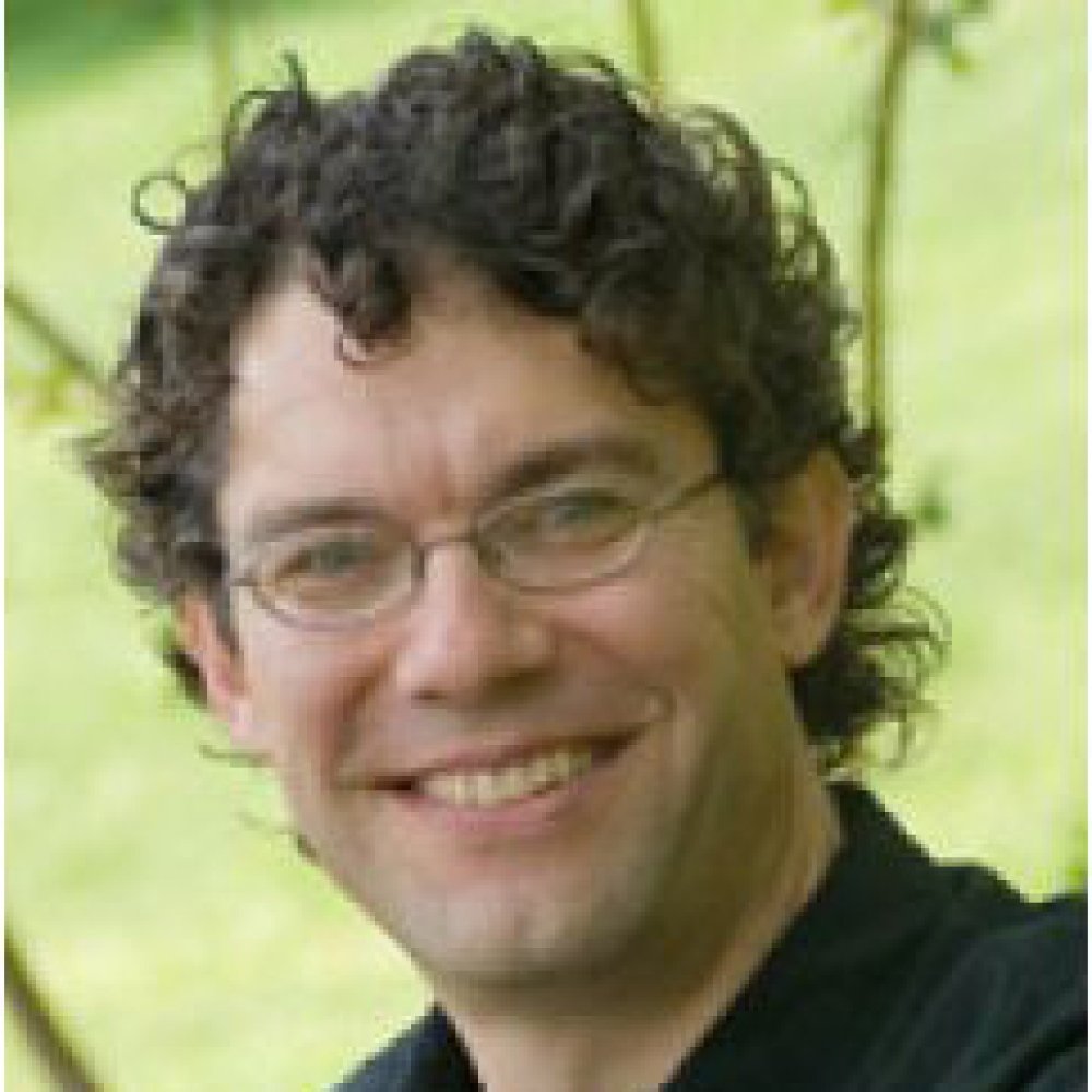 Person wearing glasses smiling