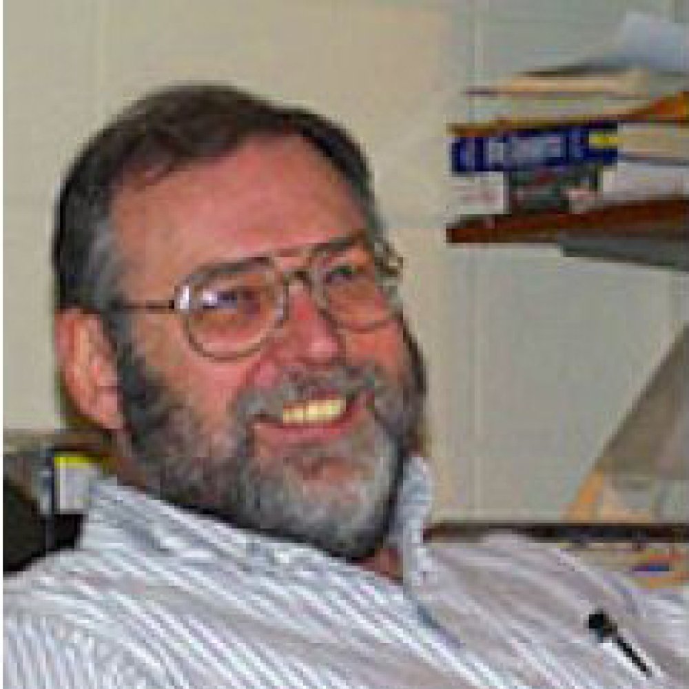 Person wearing glasses smiling
