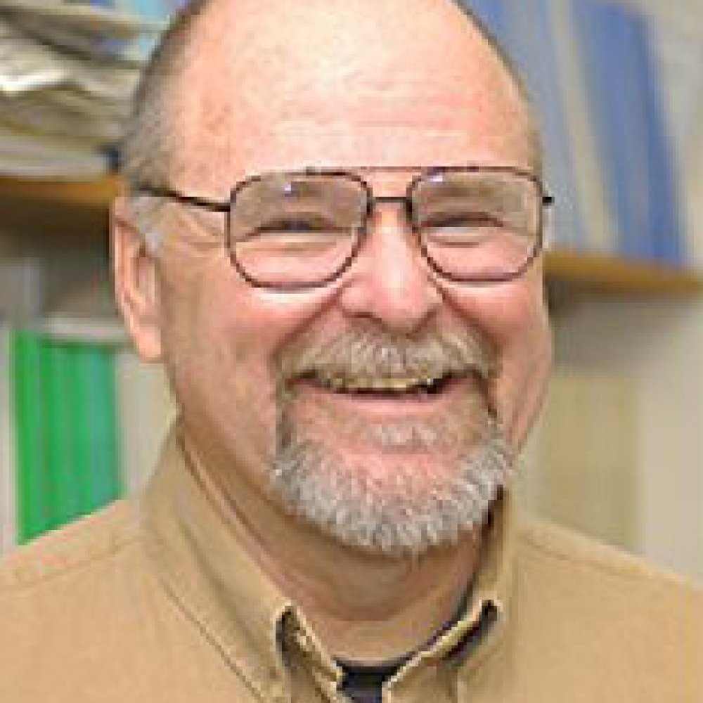 Person wearing glasses smiling