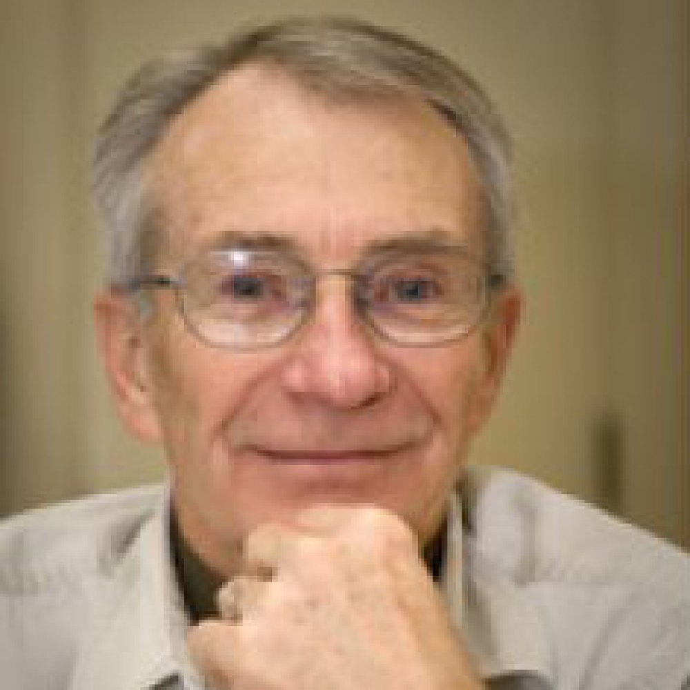 Person wearing glasses smiling
