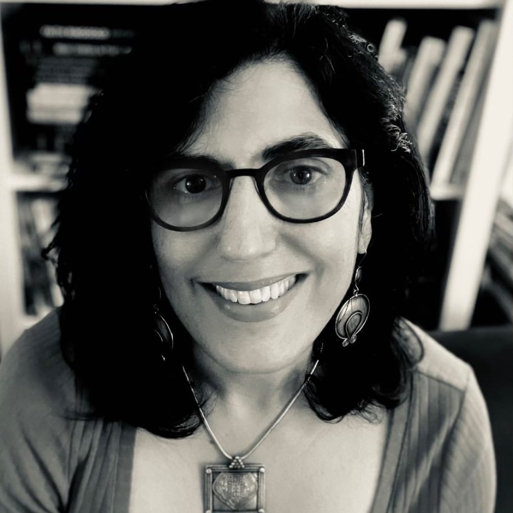 Person wearing glasses smiling