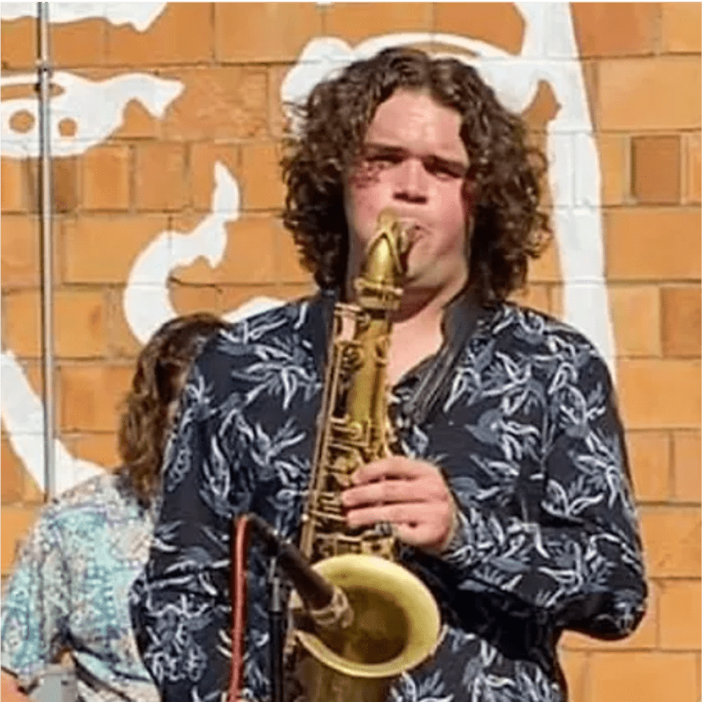 Person playing saxophone