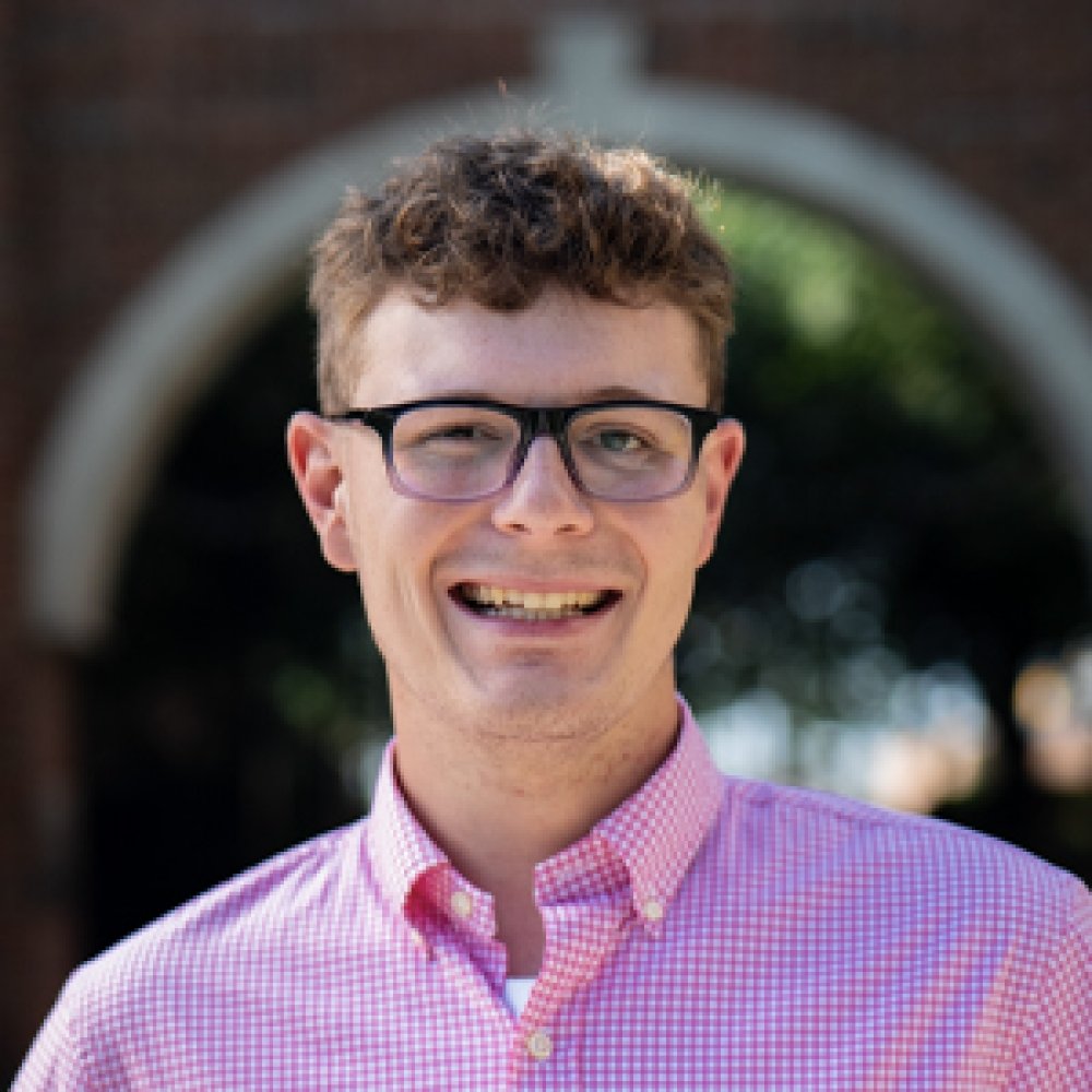 Person wearing glasses smiling