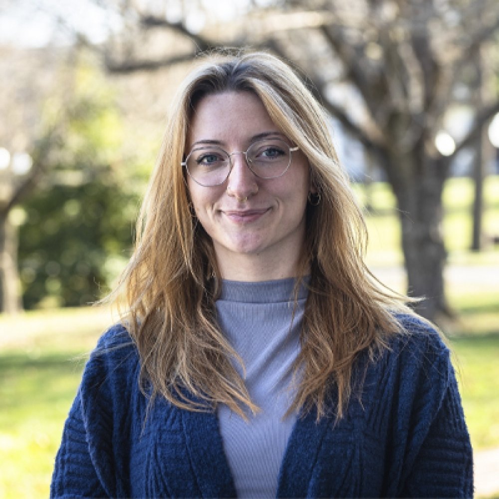 Person wearing glasses and smiling