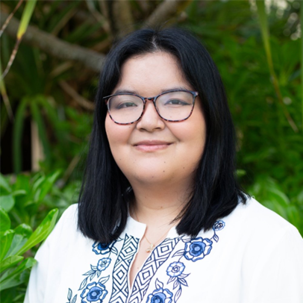 Person wearing glasses and smiling
