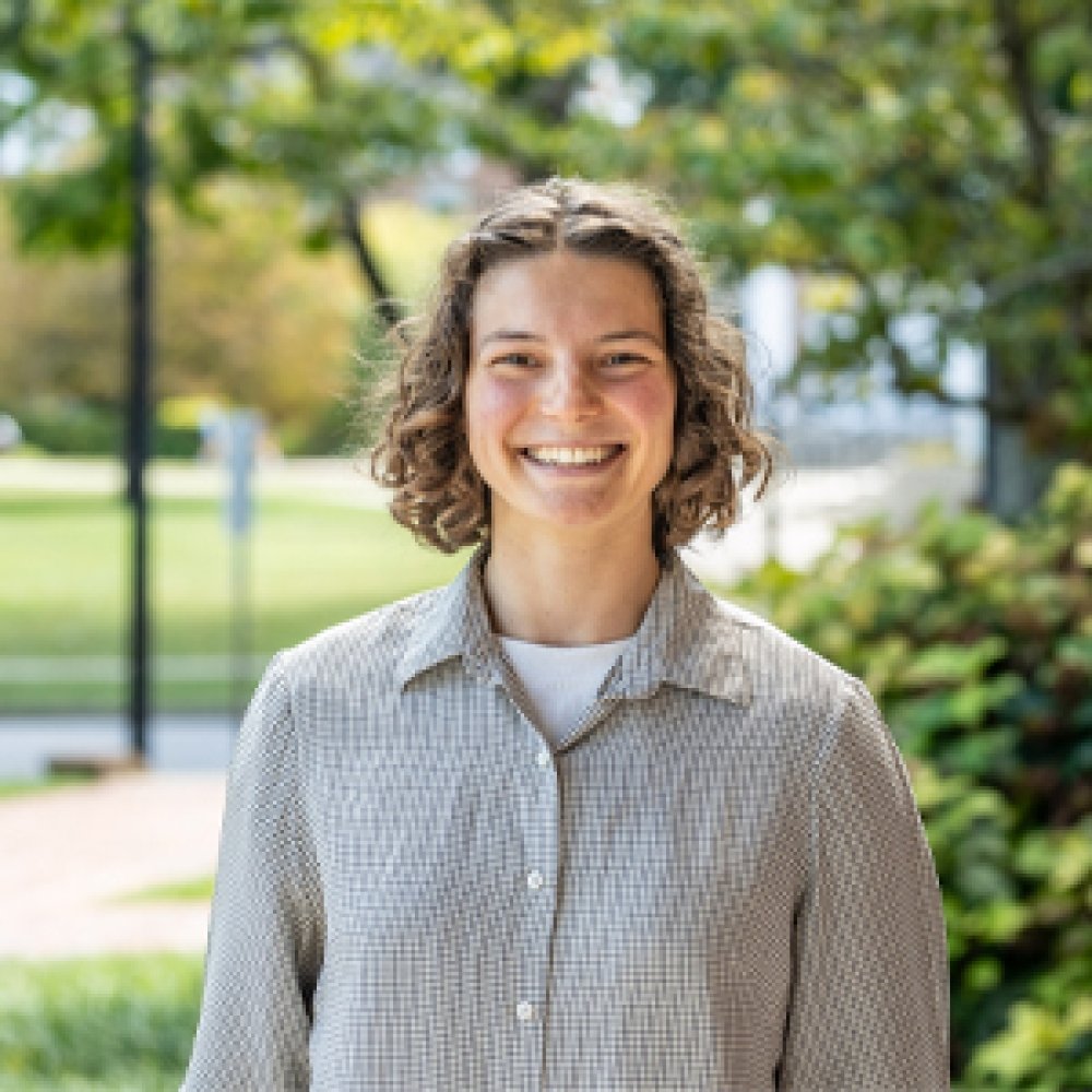 Person smiling at photographer