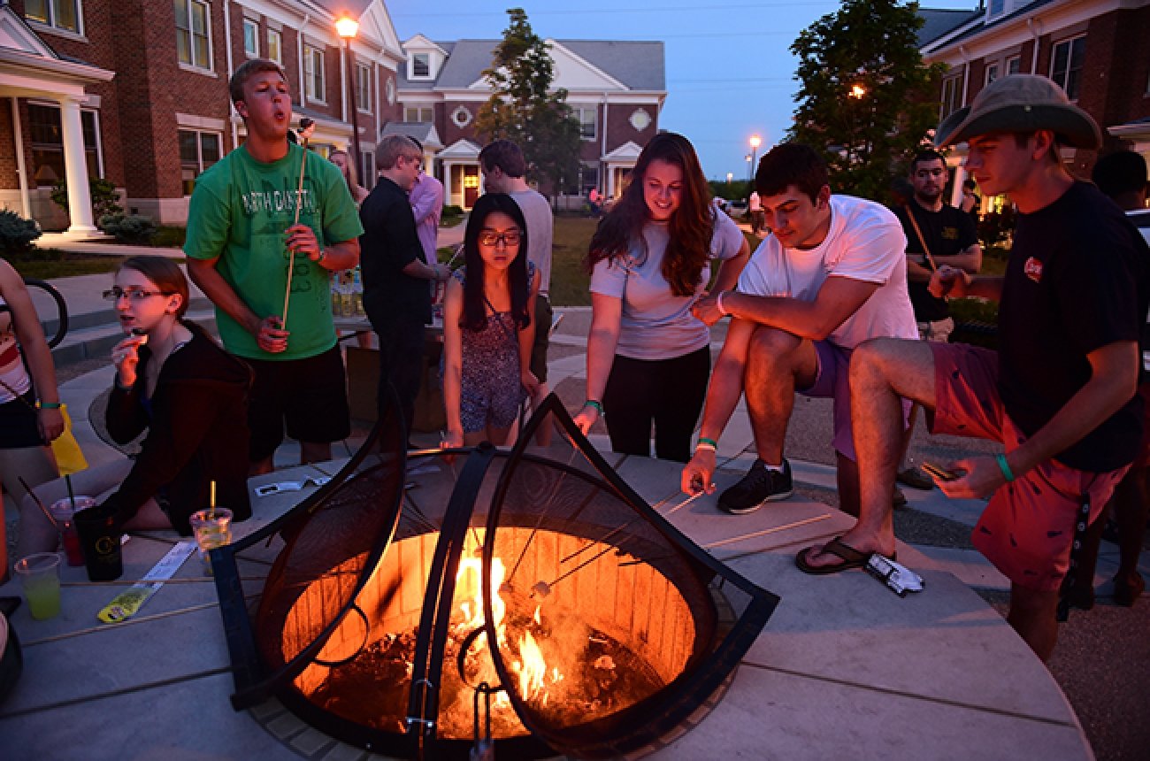 centre students enjoy making s'mores at brockman