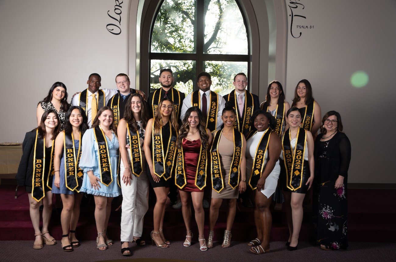 A large group of students wearing stoles that say &quot;Bonner 2022&quot;