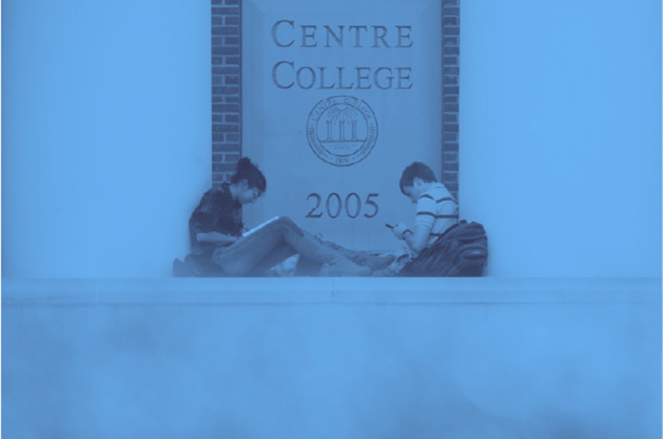 Centre students studying in front of Crounse Hall in monochrome