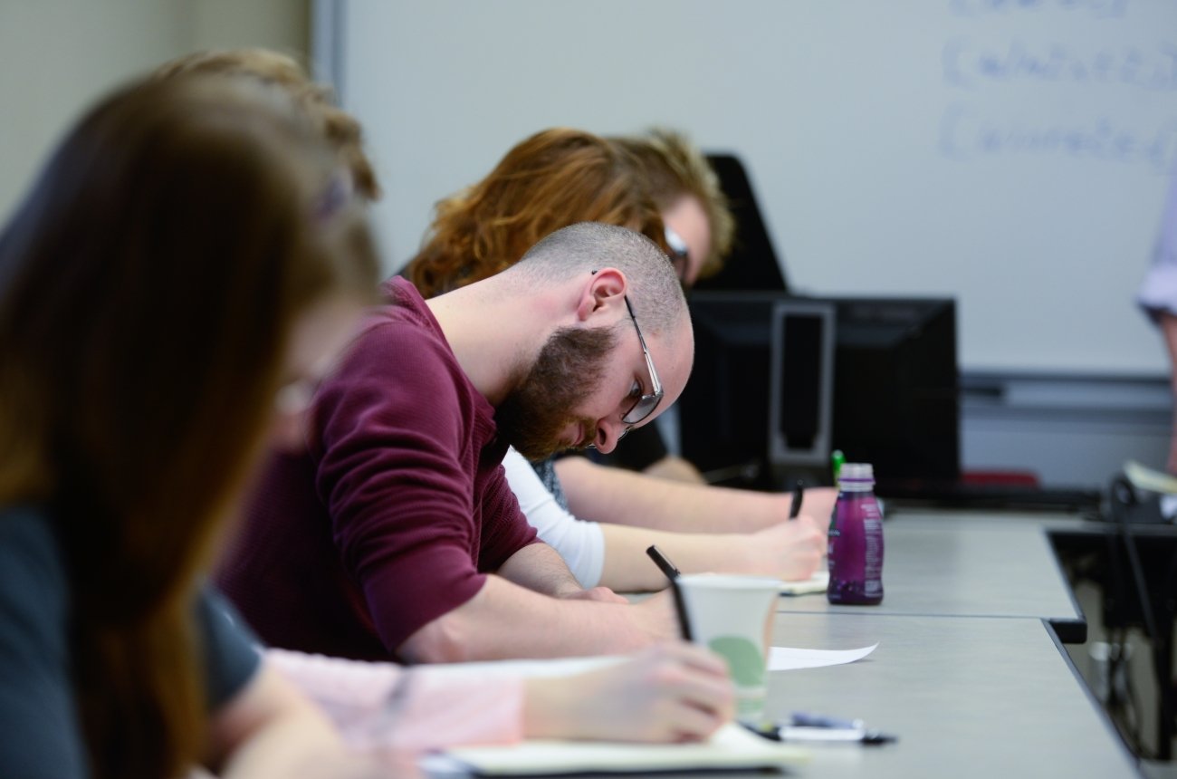 A student writing in class