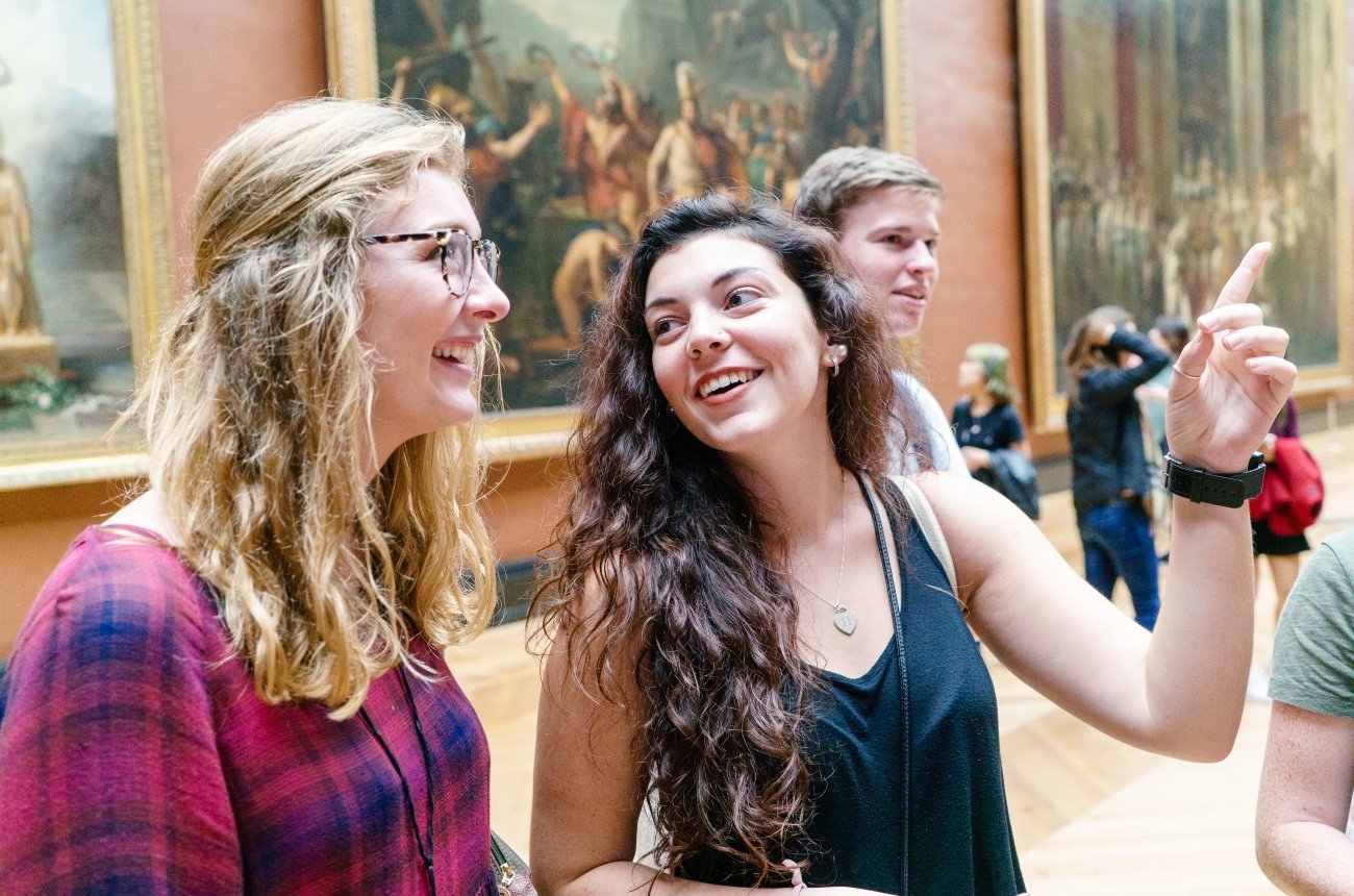 Two students at the Louvre Museum in Paris