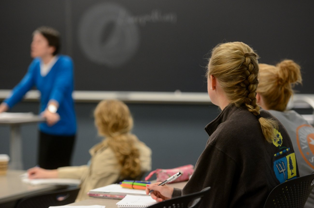 Classroom with Centre students listening to professor