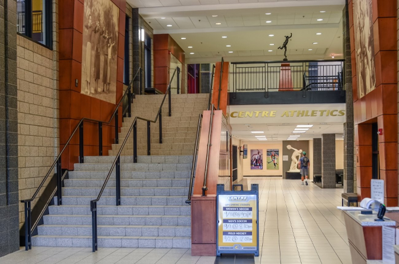 lobby inside sutcliffe with stairs going up to the second floor