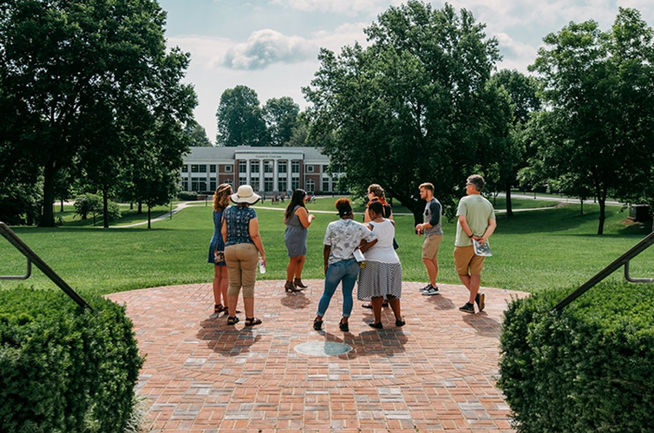 A group gathering for a campus tour