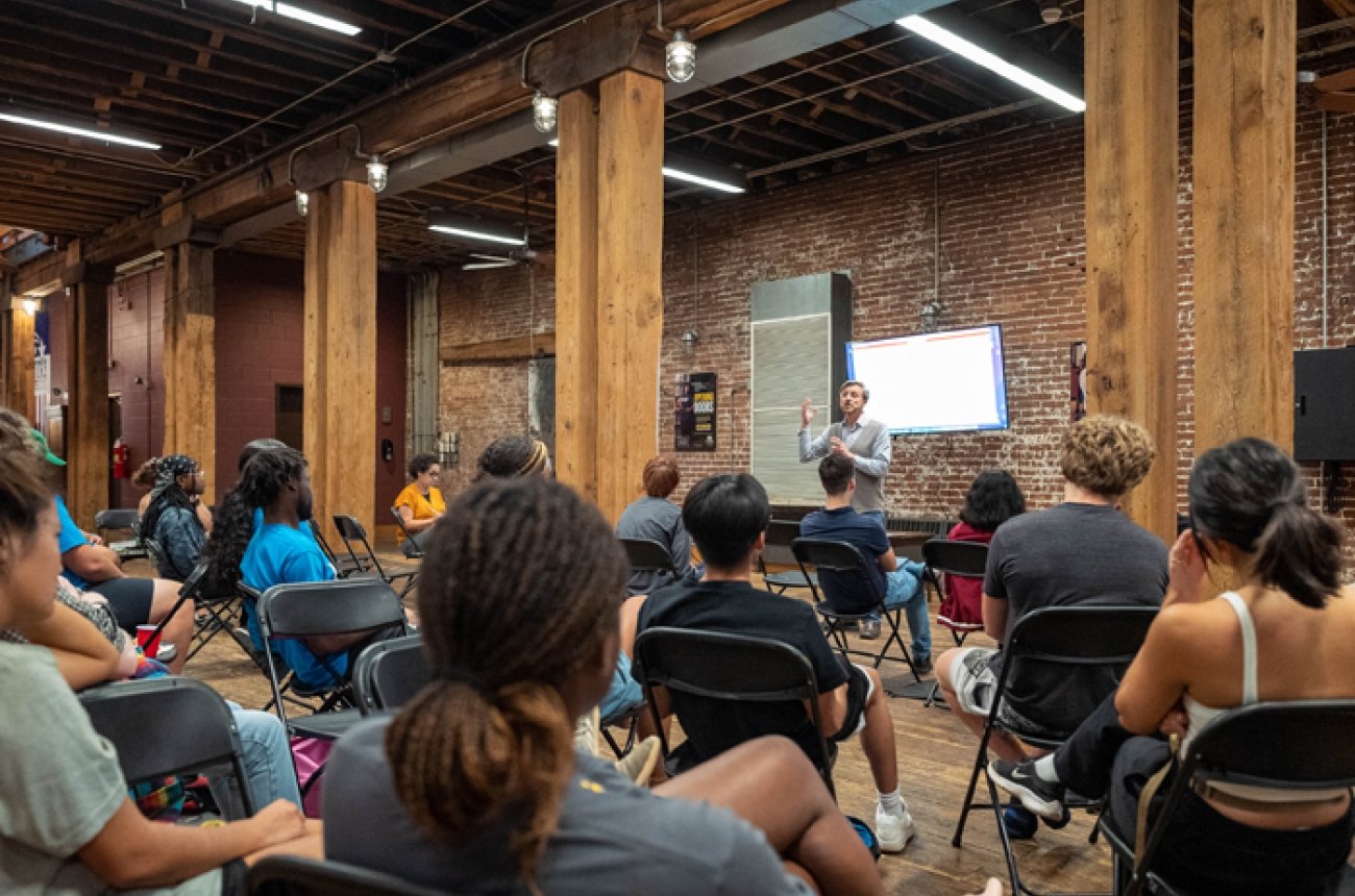 New Horizons Scholars Group listening to professor