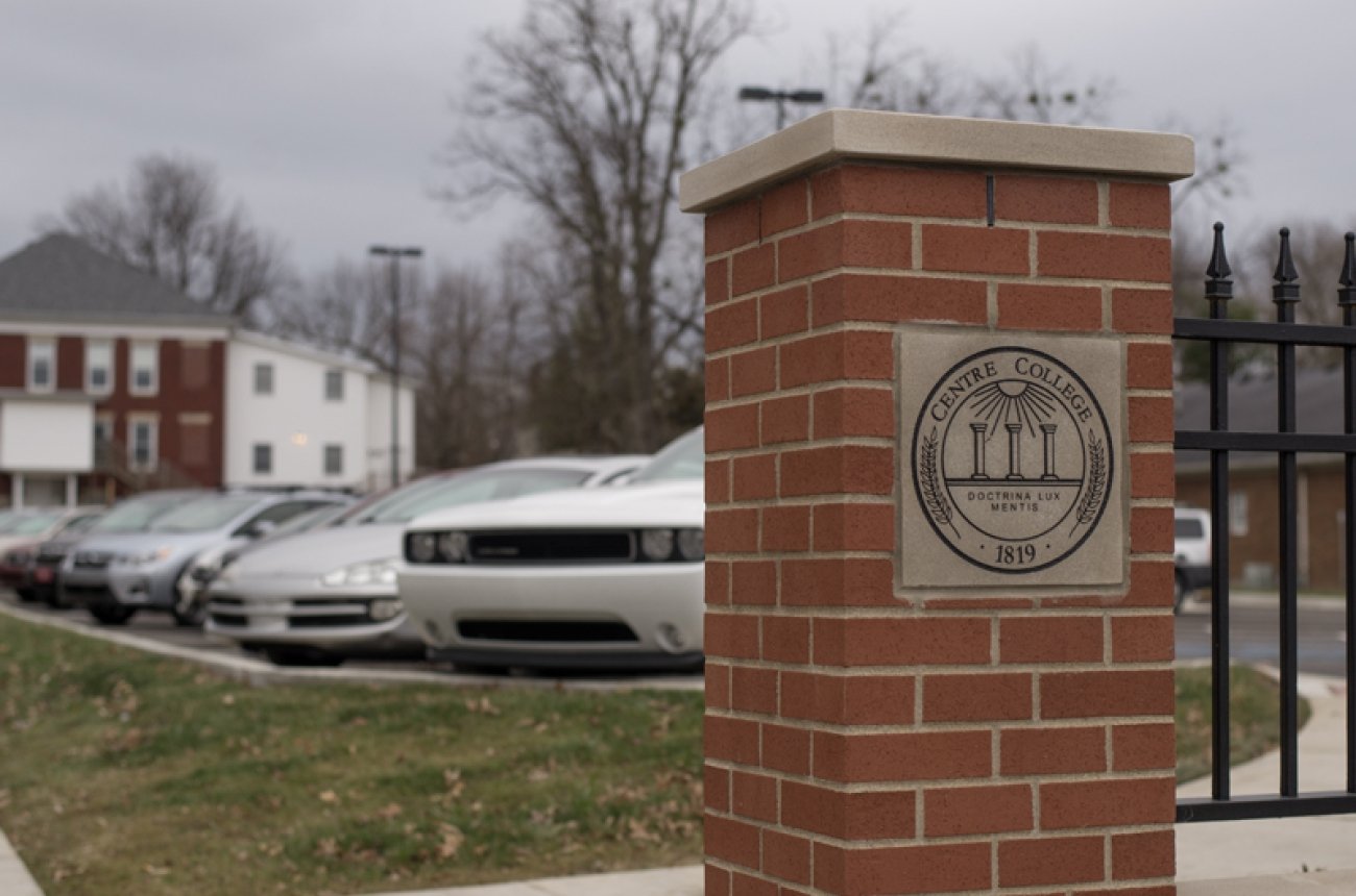 parking lot with student vehicles