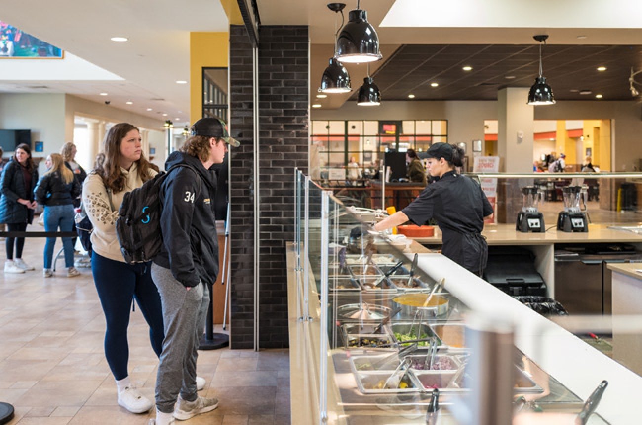 Students on food service line in Cowan