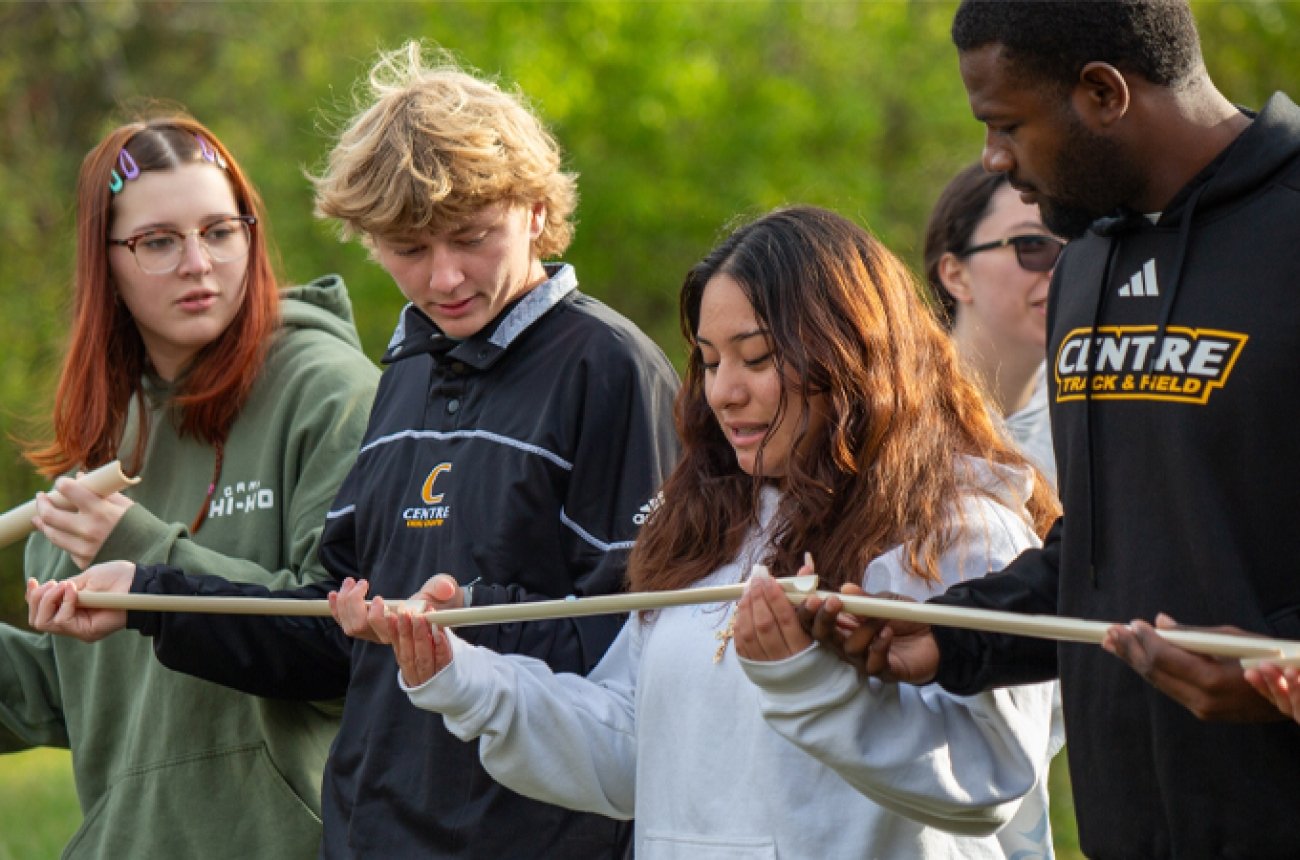 students participating in ropes challenge course