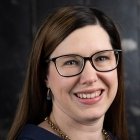 Person wearing glasses smiling