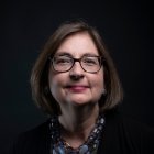 Person wearing glasses smiling