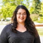 Person wearing glasses smiling