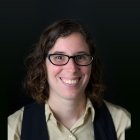 Person wearing glasses smiling