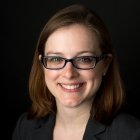 Person wearing glasses smiling