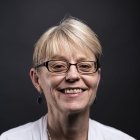 Person wearing glasses smiling