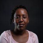 Person wearing glasses smiling