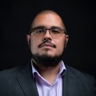 Person wearing glasses smiling