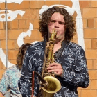 Person playing saxophone