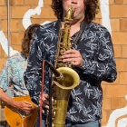Person playing saxophone