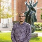 Person wearing glasses smiling