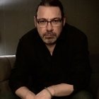 Person wearing glasses smiling