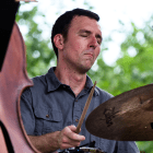 Person playing drum set