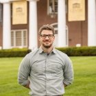 Person wearing glasses smiling